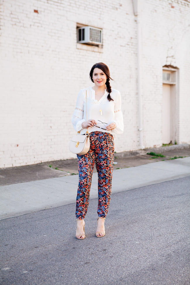 Parker blouse and Joie floral pants by style blogger Kendi Everyday.