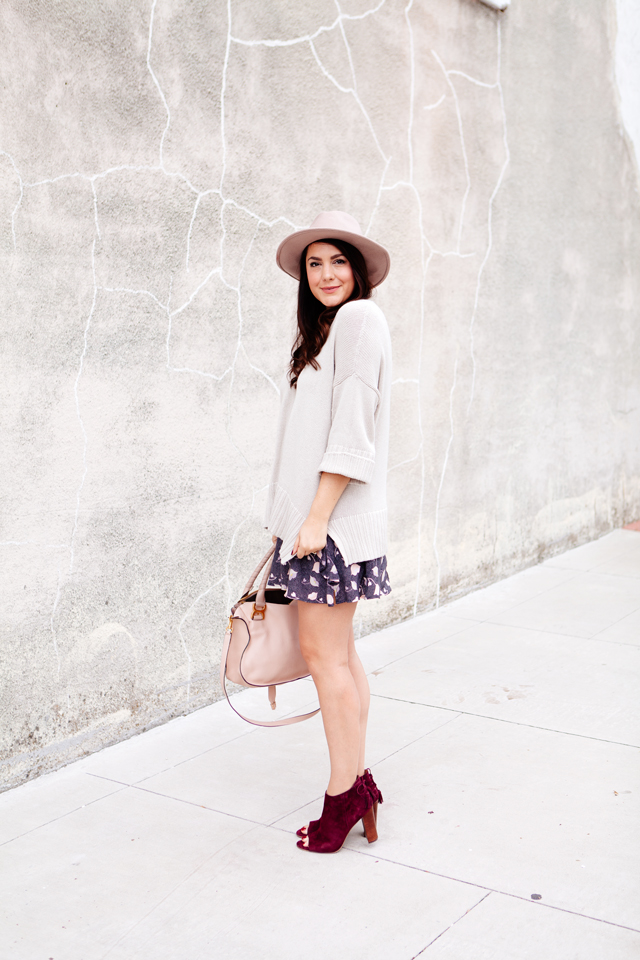 Floral mini skirt and oversized sweater from LOFT. 