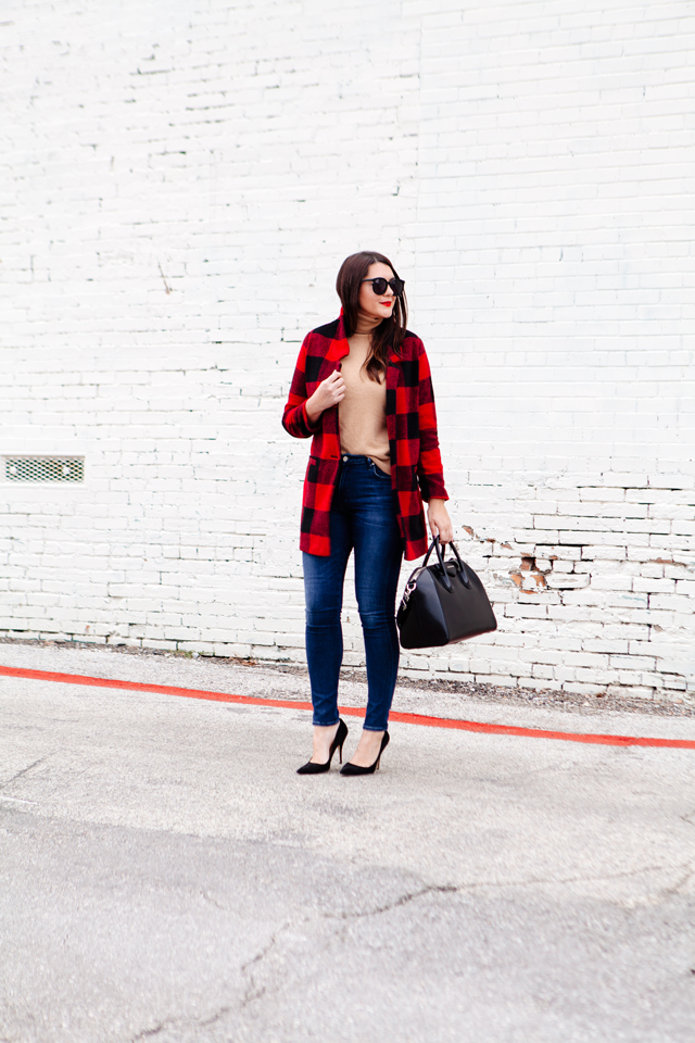 Buffalo plaid jacket with camel sweater and black heels on Kendi Everyday.